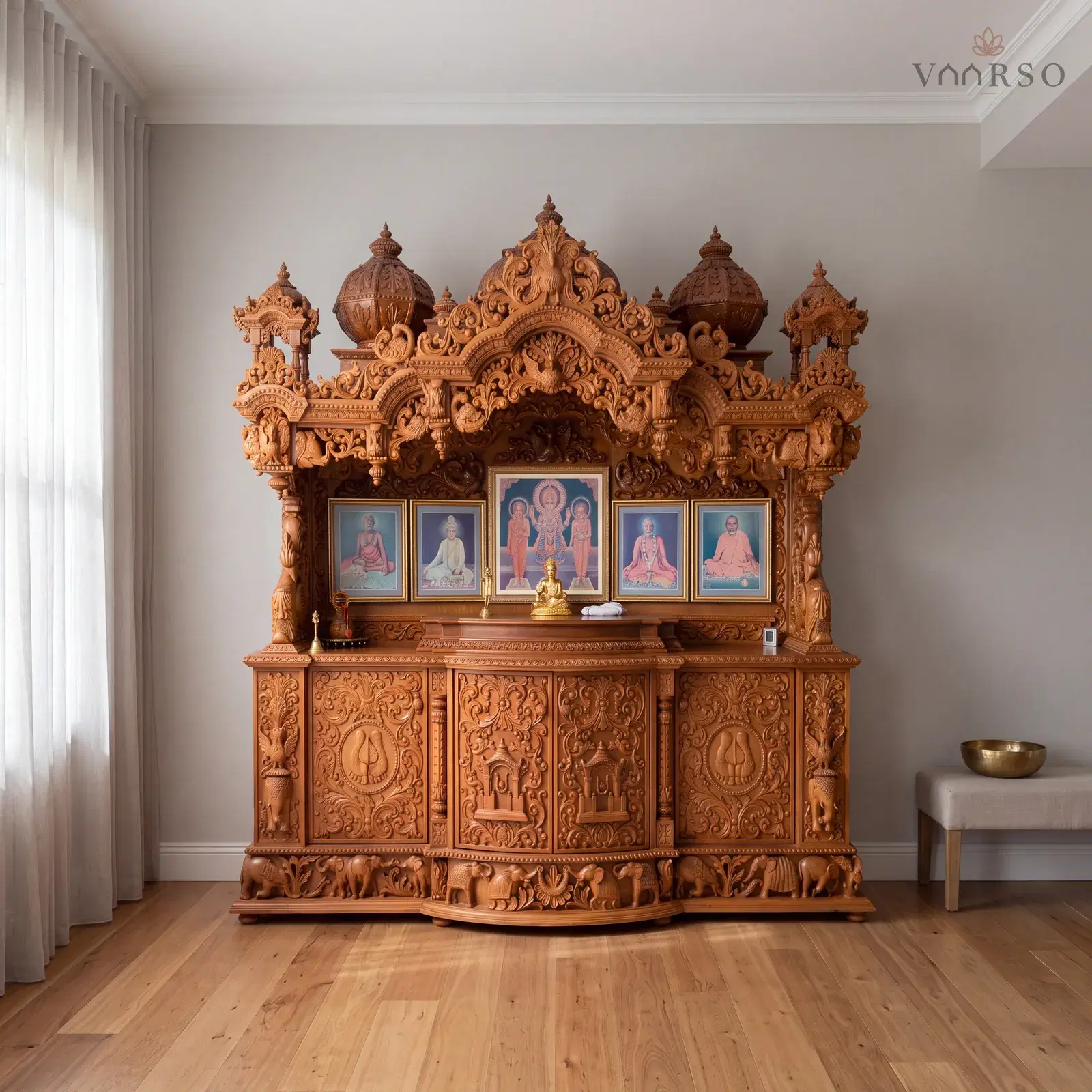 The same mandir in a quiet corner of an open-plan living room, a wide window to one side, blackbutt boards underfoot and a linen-covered bench carrying a single brass bowl