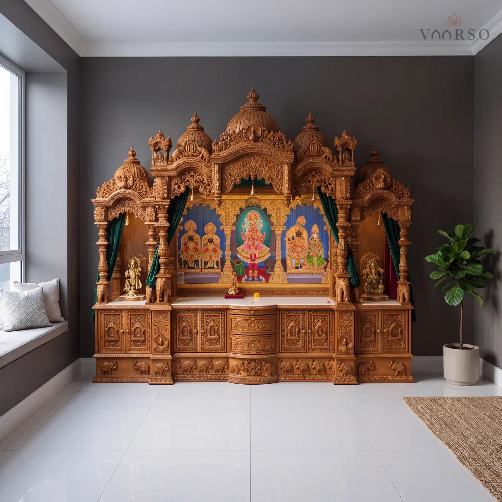 The same mandir in a small study retreat, a window seat along one side, white porcelain tile underfoot and a fiddle-leaf fig in a ceramic pot to one side